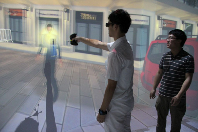 Introducing one of the user interfaces with the use of  trackers, joysticks and motion platform connected to the imseCAVE.